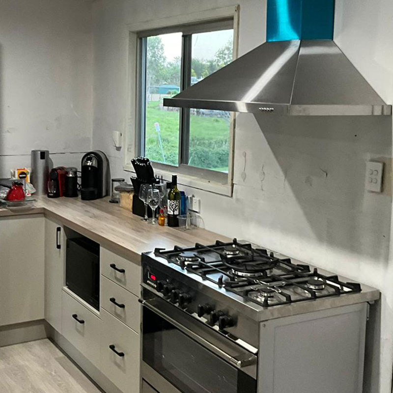 Modern kitchen with gas stovetop and oven we installed