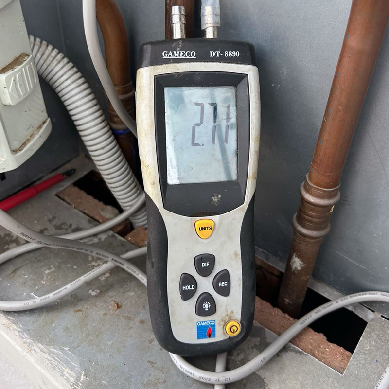 Closeup of manometer testing mains pressure